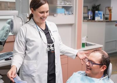 Dr Mooney speaking to a patient about sleep apnea