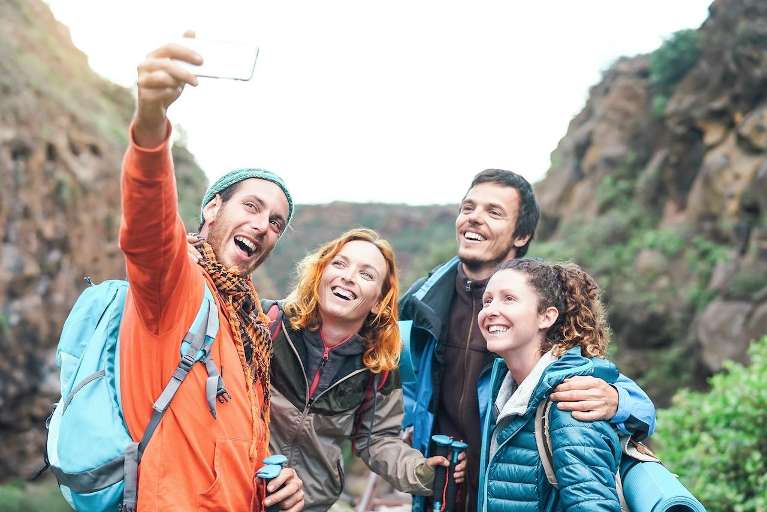 A group of friends hiking | dentist arlington