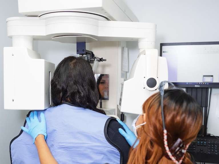 A patient getting digital x-rays at her Arlington dentist